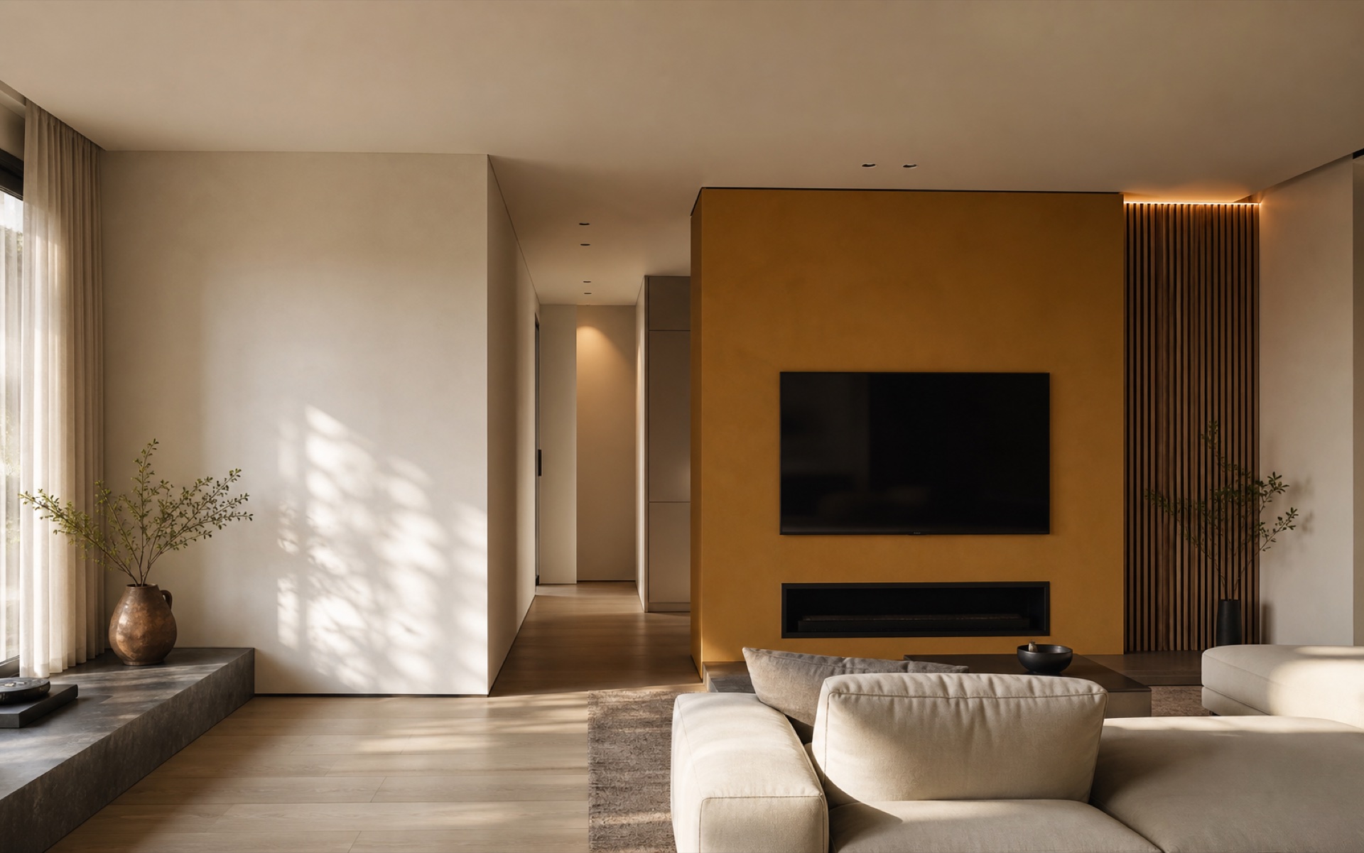 Immagine editoriale di un interno contemporaneo rinnovato nei toni crema e ocra